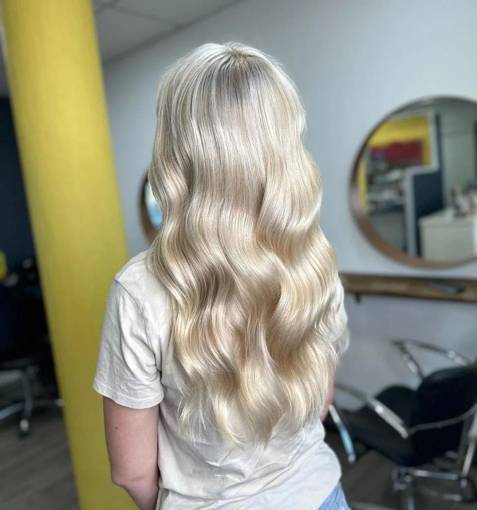Woman With Long, Crimped Blonde Hair in a Salon — Oh So Blonde Hair Studio in Buddina, QLD