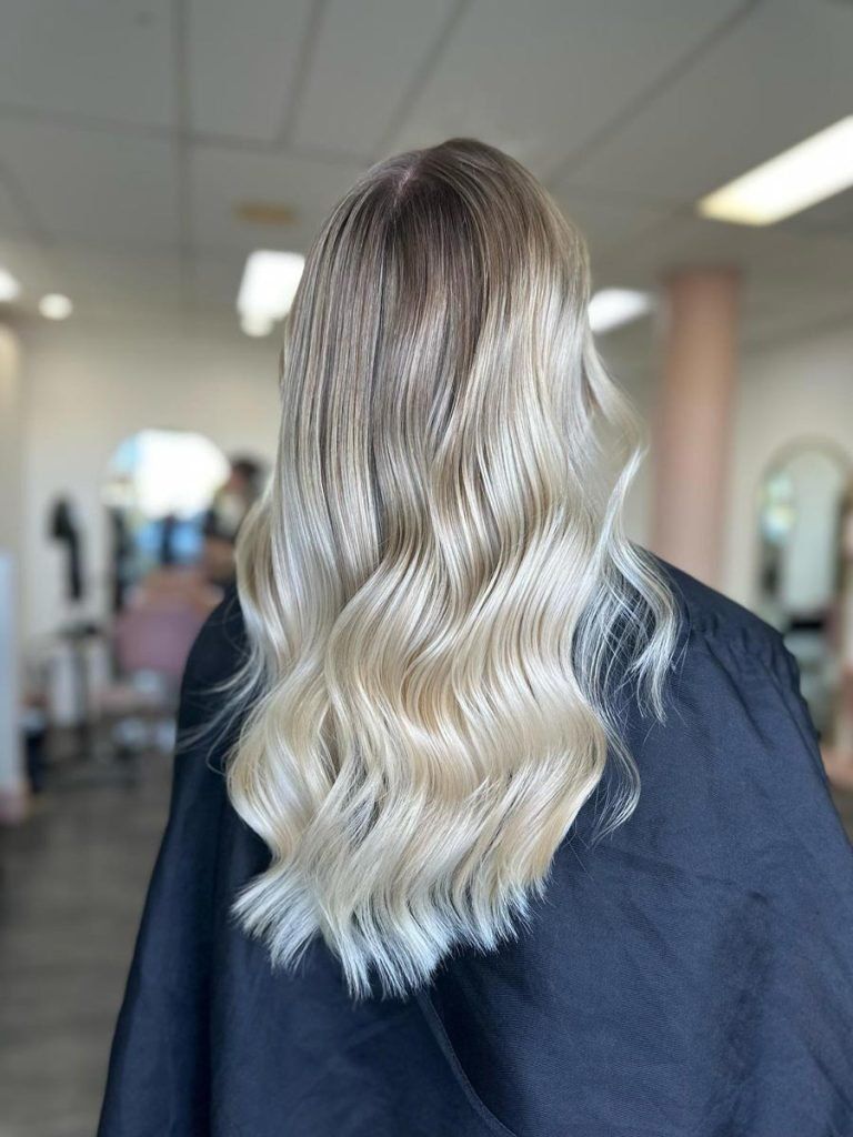 Woman With Long, Wavy, Crimped Blonde Hair — Oh So Blonde Hair Studio in Buddina, QLD