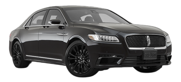 A black Lincoln Continental sedan viewed from the front passenger side against a white background.