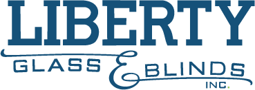The logo for liberty glass and blinds inc.
