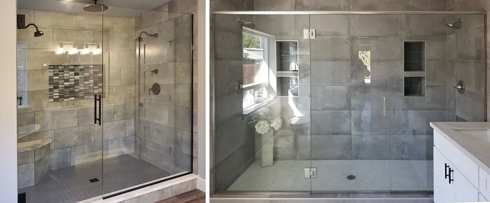 Two modern glass-enclosed showers with gray tiled walls. One has a built-in bench.