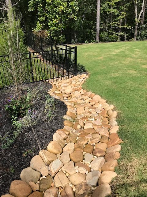A retaining wall behind a business