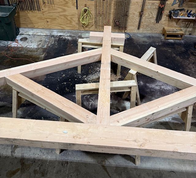 A timber truss with an orthodox cross as the center pole