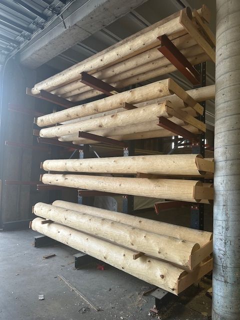 a lumber rack of logs