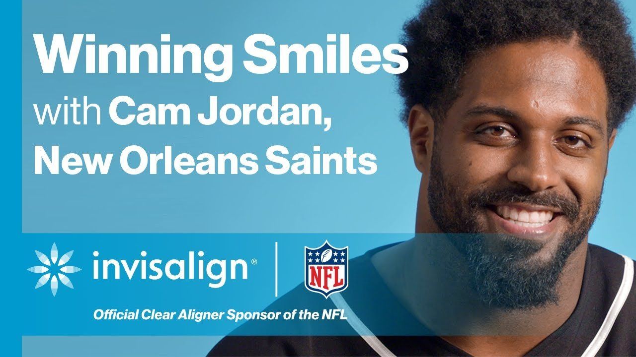 An advertisement for invisalign shows a man smiling