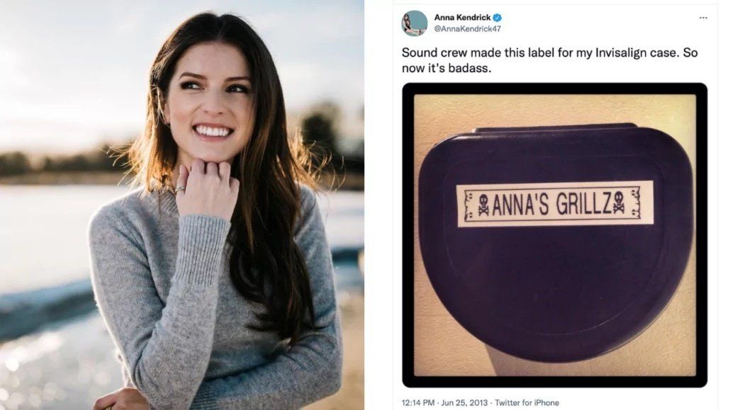 A woman is smiling next to a picture of a grillzr