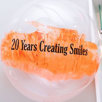 A balloon that says 20 years creating smiles on it