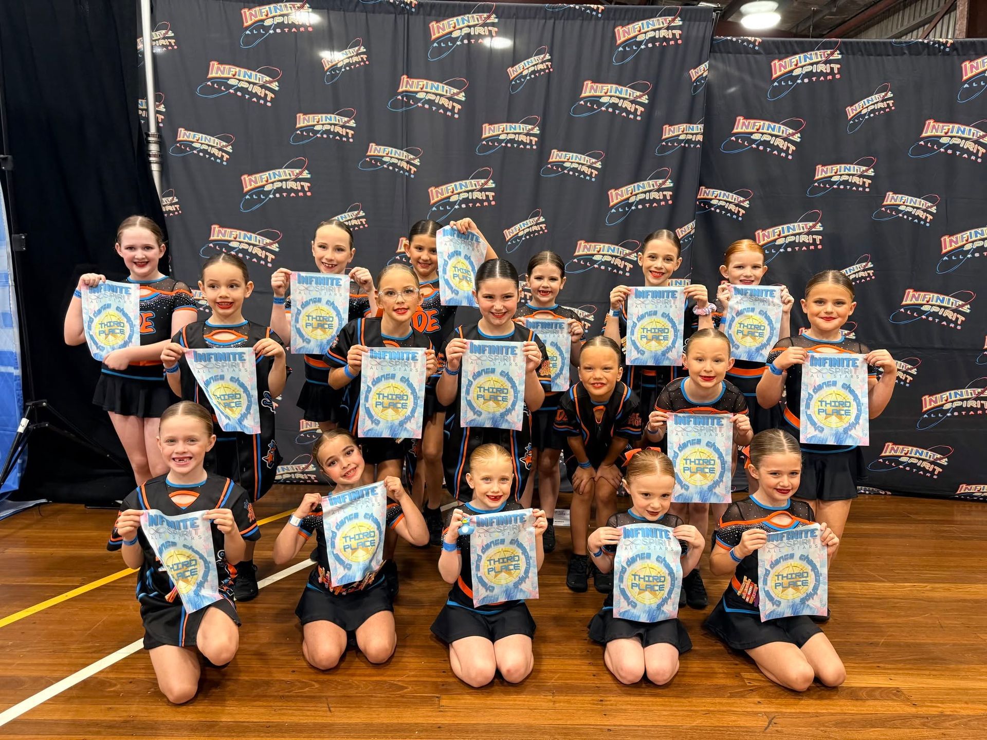 Group of Children Posing on a Gym Floor — Dance Express Mackay In North Mackay, QLD
