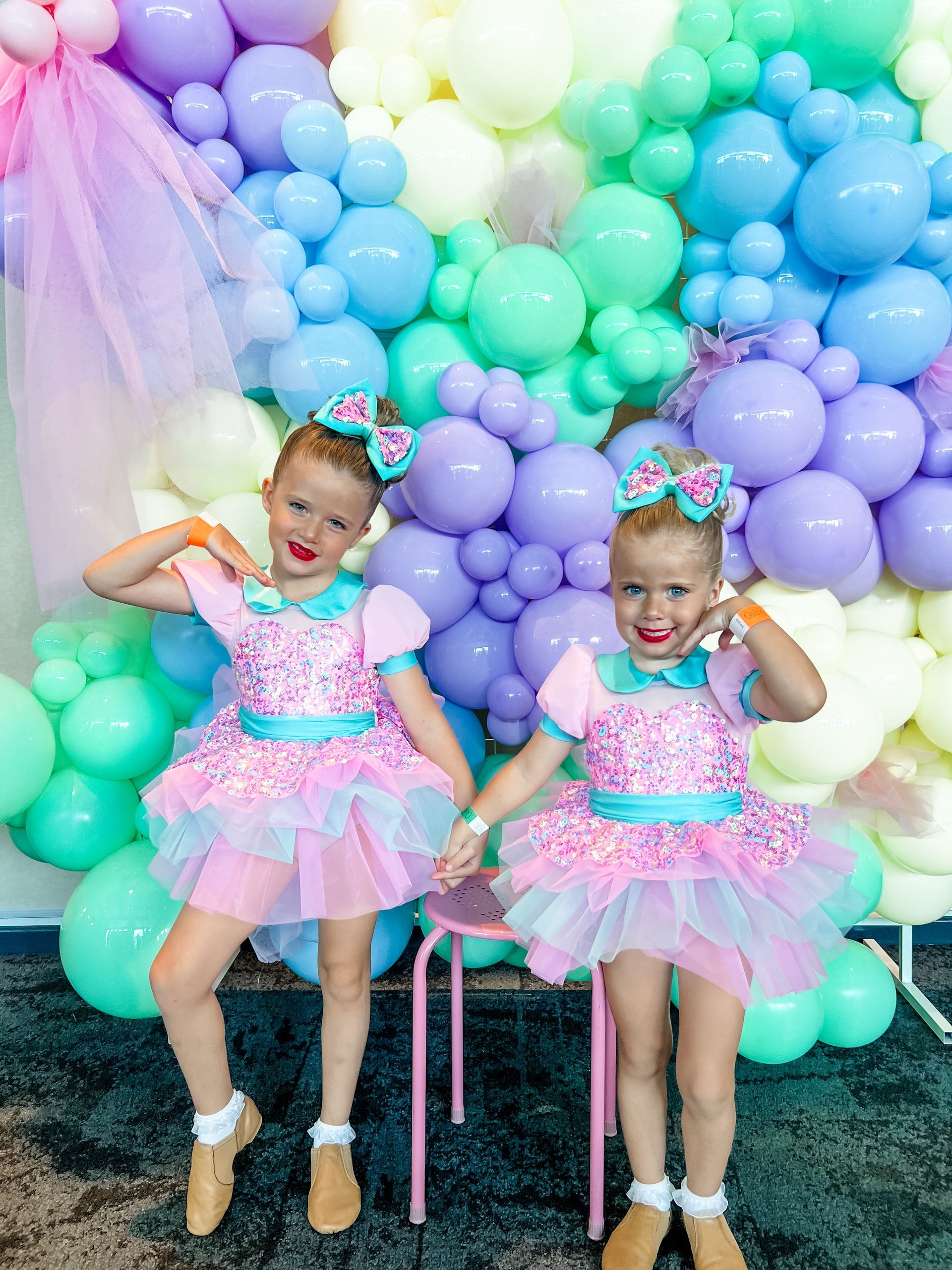 A woman is teaching a little girl how to dance in a dance studio — Dance Express Mackay In North Mackay, QLD