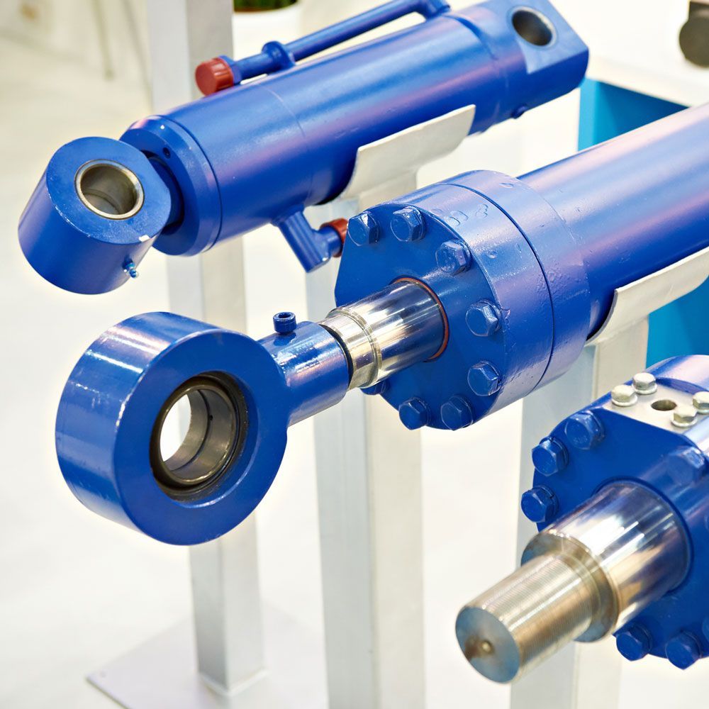 Blue Hydraulic Cylinders — South Fork, PA — Reighard Machine Inc.