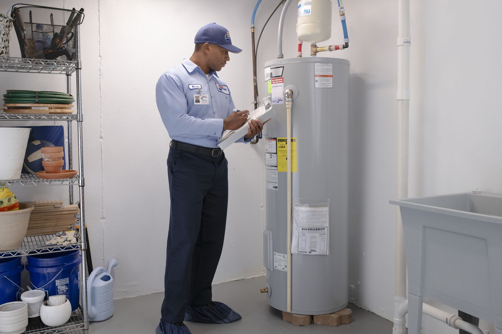 Roto-Rooter Tech testing electric water heater