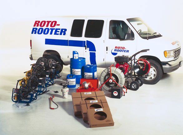 Roto-Rooter van with machines