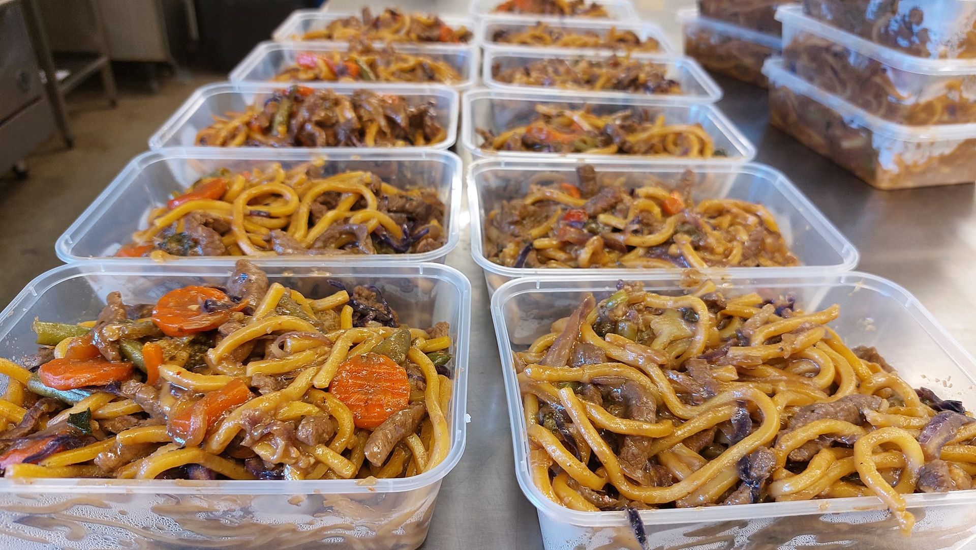 Many Clear Plastic Containers Filled With Cooked Noodles, Vegetables, and Meat — Tre's Food To You in Mount Sheridan, QLD