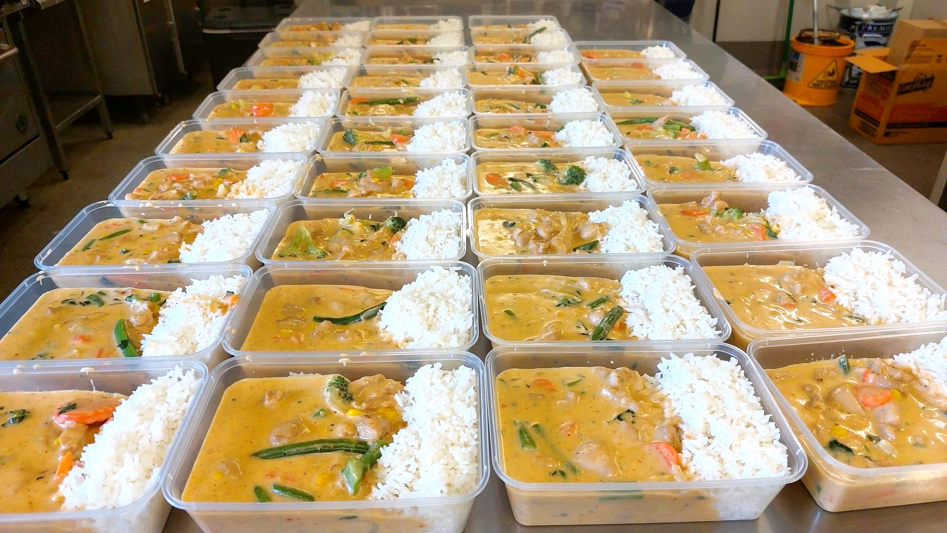 Many Clear Plastic Containers Filled With Curry and White Rice — Tre's Food To You in Mount Sheridan, QLD