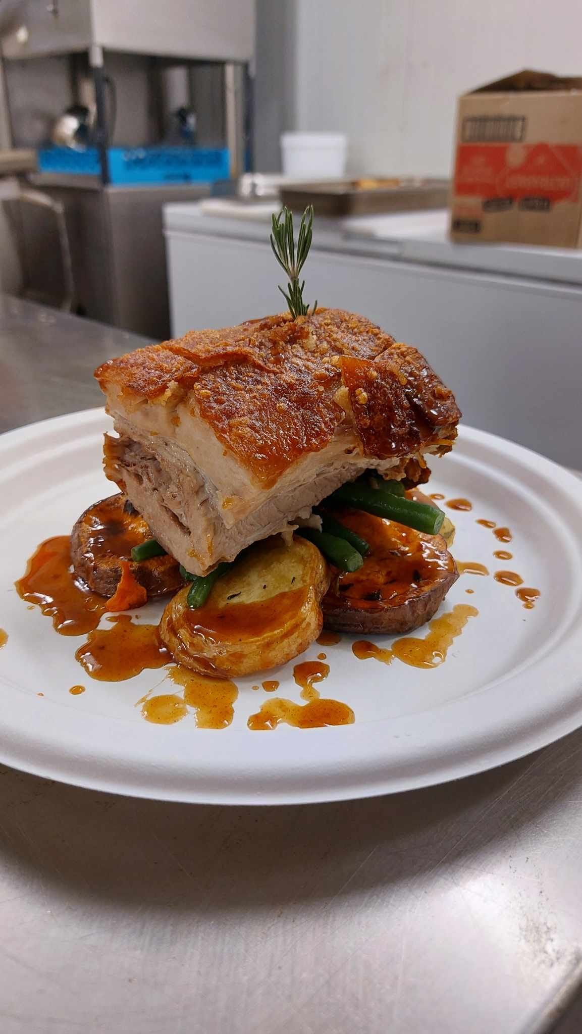 A Piece of Roasted Pork Belly With Crispy Skin Rests — Tre's Food To You in Mount Sheridan, QLD