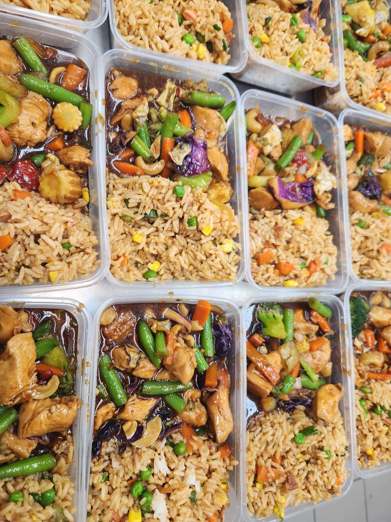 Multiple Plastic Containers Each Holding a Serving of Stir-fried Chicken — Tre's Food To You in Mount Sheridan, QLD