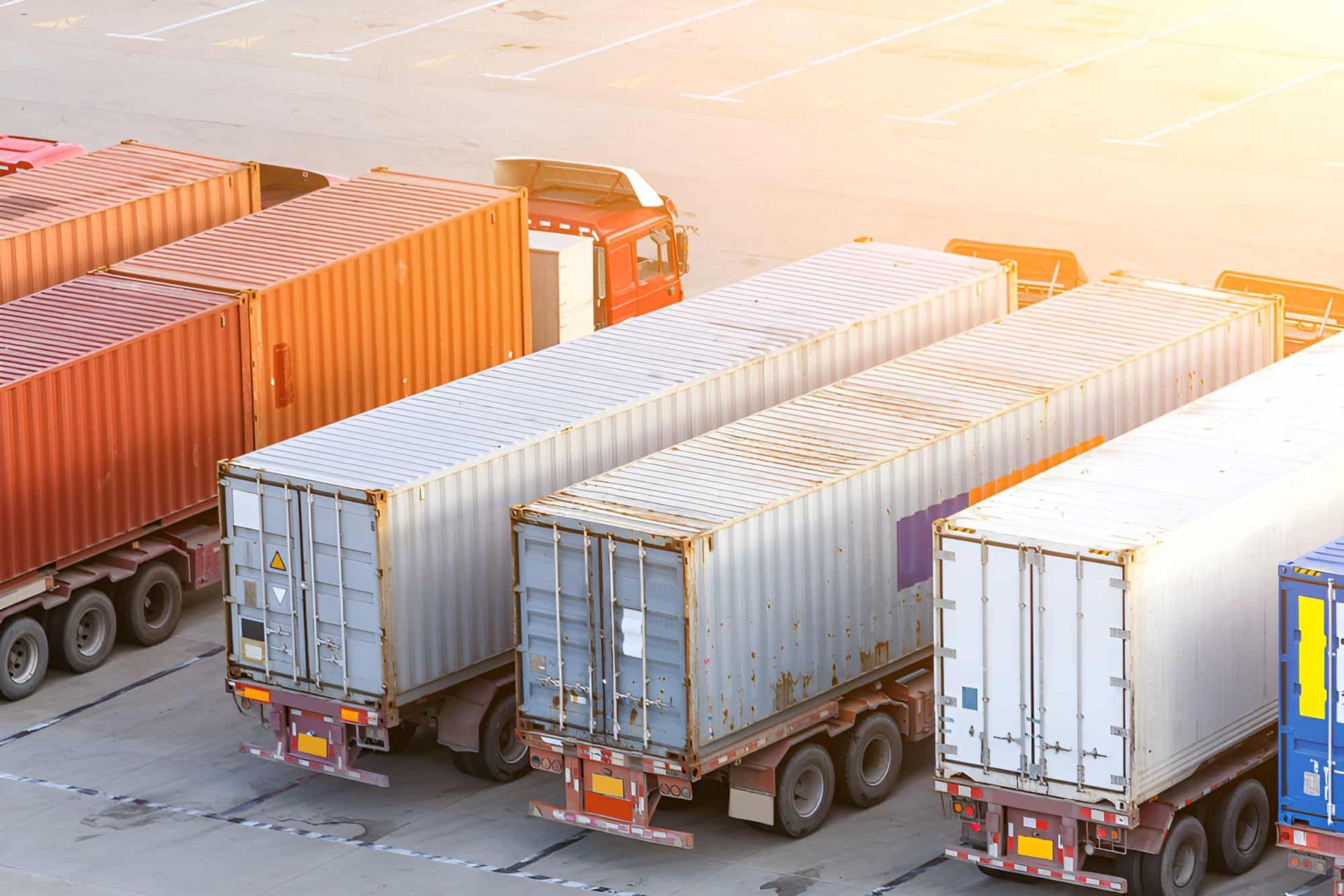 A Row Of Shipping Containers Are Parked — Central Desert Transport In Ciccone, NT