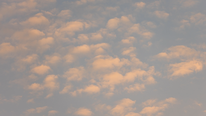 yellow clouds with a blue sky