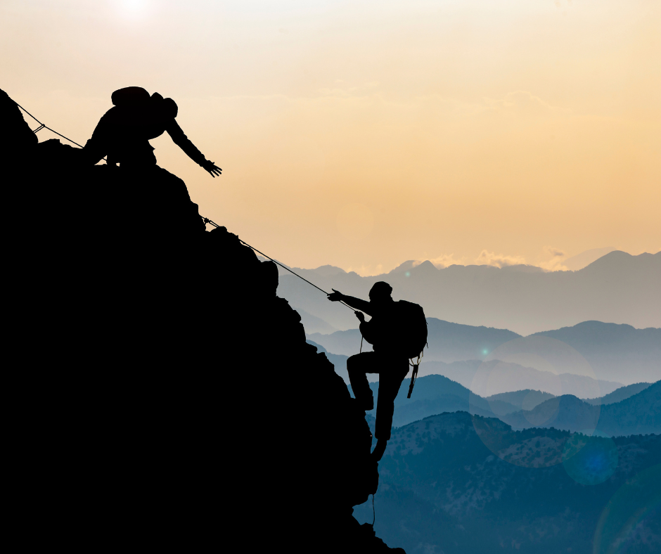 climbers helping each other