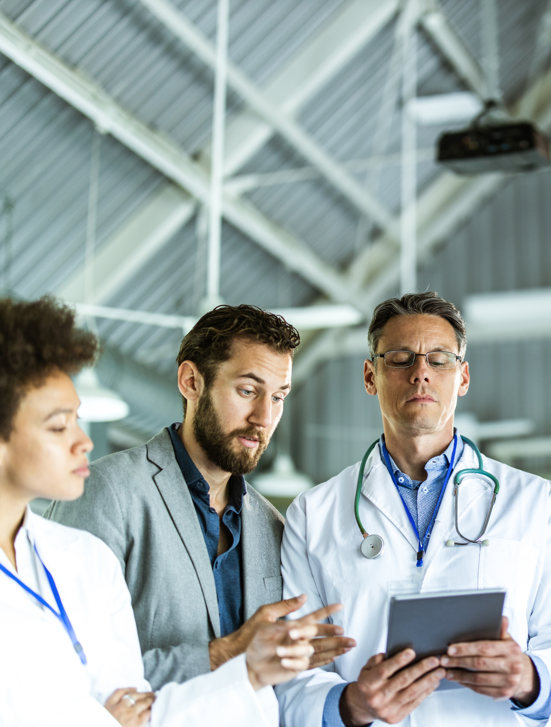 Healthcare professionals reviewing clinical information in a medical setting