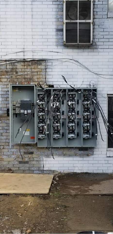 Apartment electrical meter installation in progress by NS Electric WV