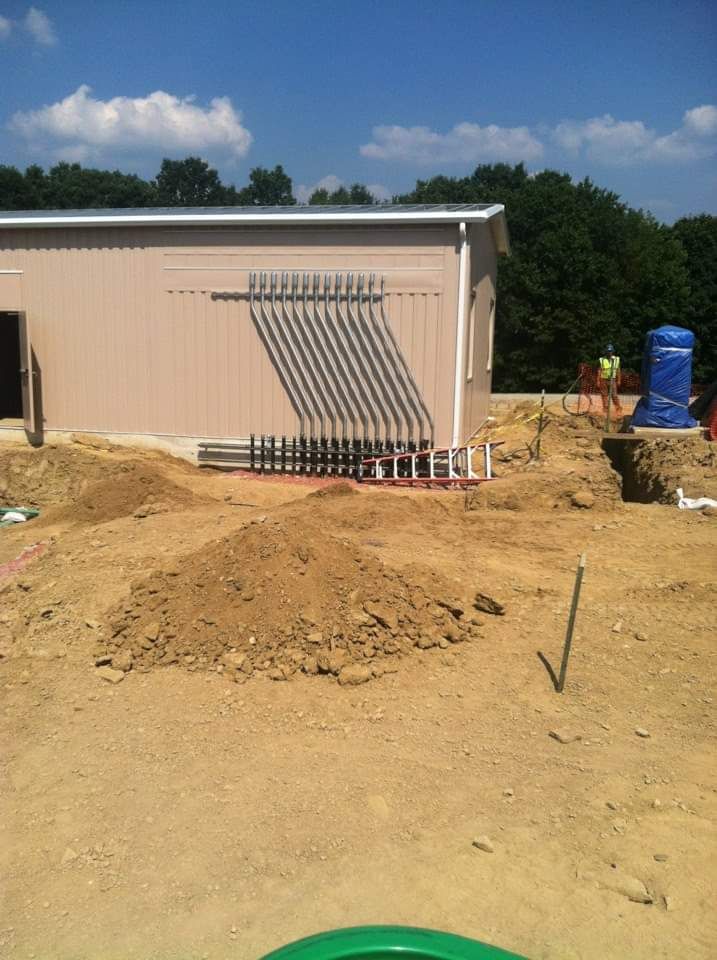 Industrial building with electrical conduit pipes installed by NS Electric
