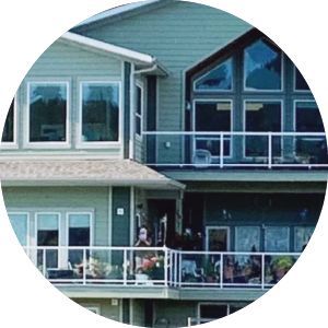 A large house with a lot of windows and balconies