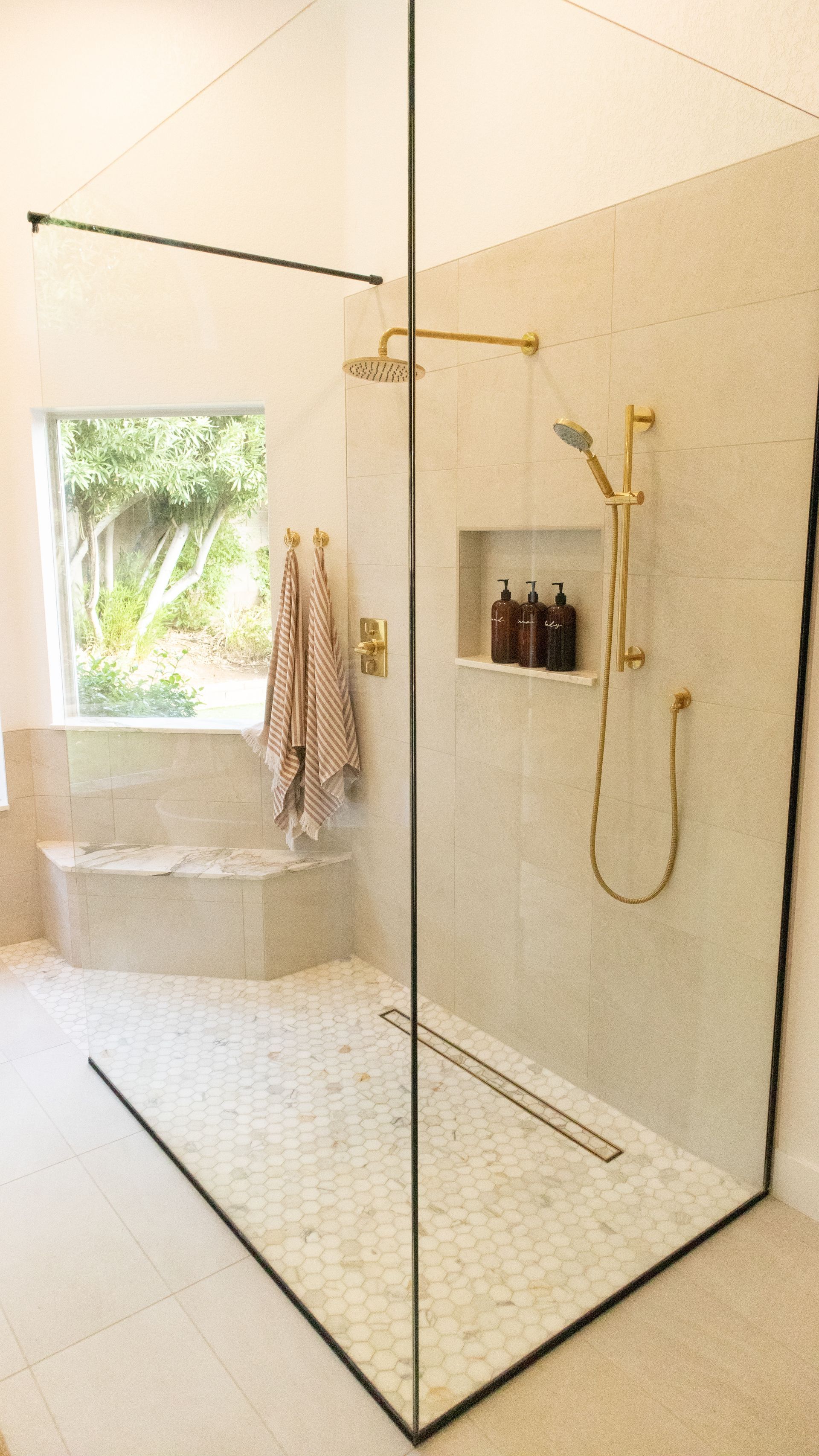 A Frameless Shower Screen A Frameless Shower Screen