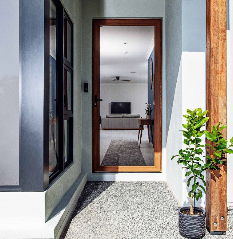 Glass With Scratches — Glass Repairs & Installations in Taminda, NSW Crimsafe Wood Grain And Glass — Glass Repairs & Installations in Taminda, NSW