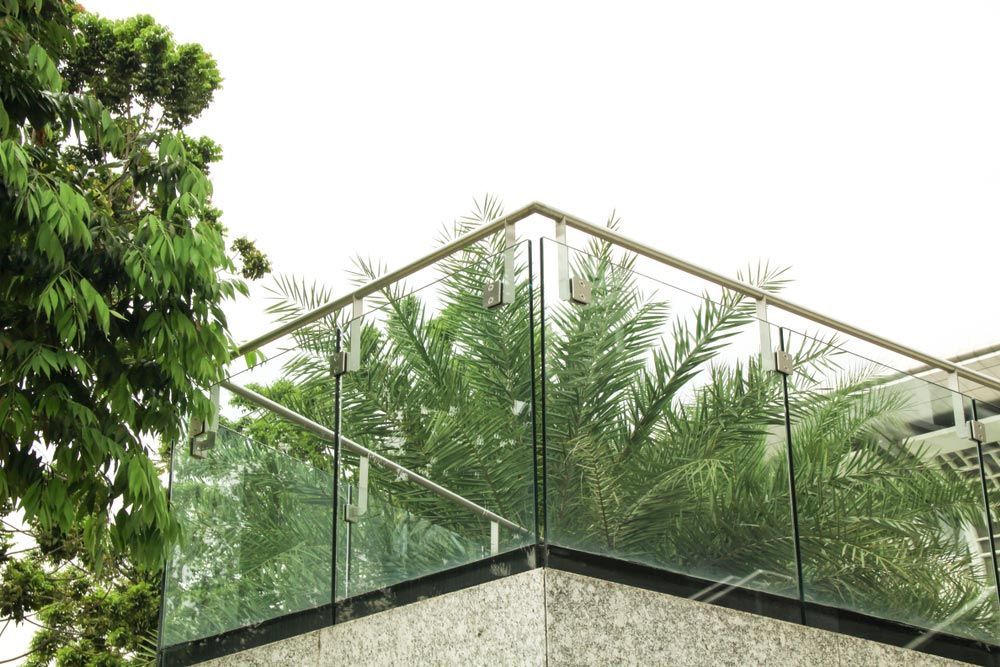 Laminated Glass Balustrade Of A House — Glass Repairs & Installations in Taminda, NSW Laminated Glass Balustrade Of A House — Glass Repairs & Installations in Taminda, NSW