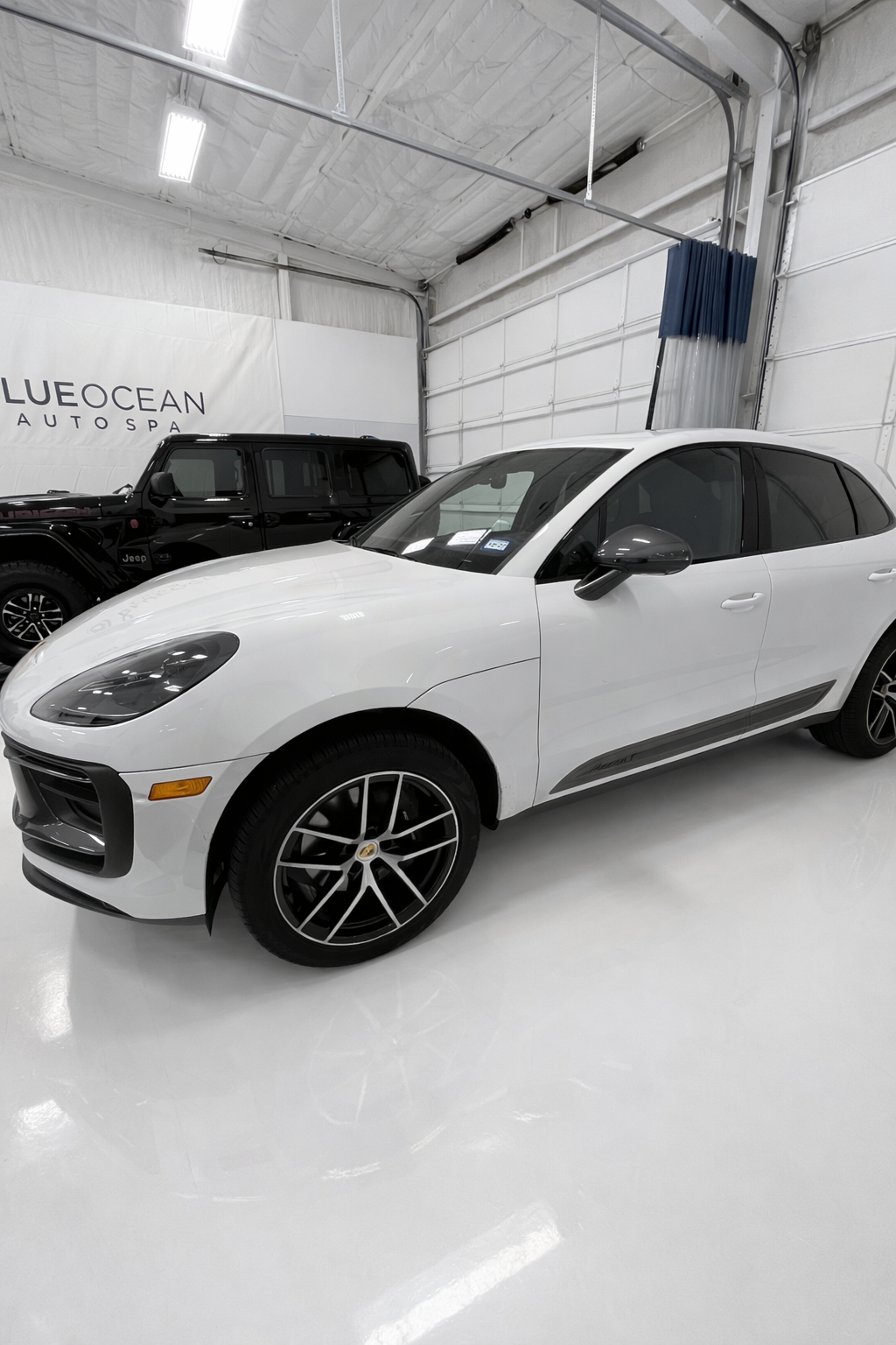 2025 Porsche Macan shown here in the Blue Ocean Auto Spa studio after receiving the following services: Paint Correction and Ceramic Coating