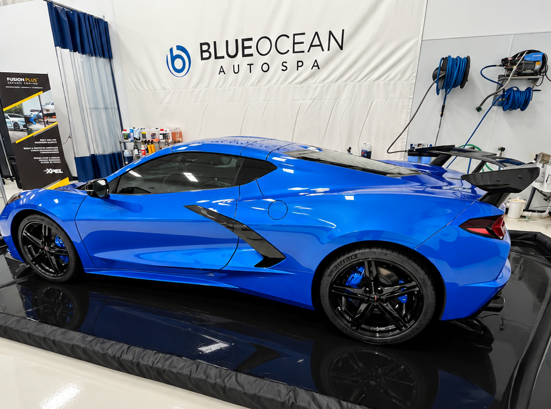 Side view of blue 2026 C8 Corvette after paint enhancement and ceramic coating
