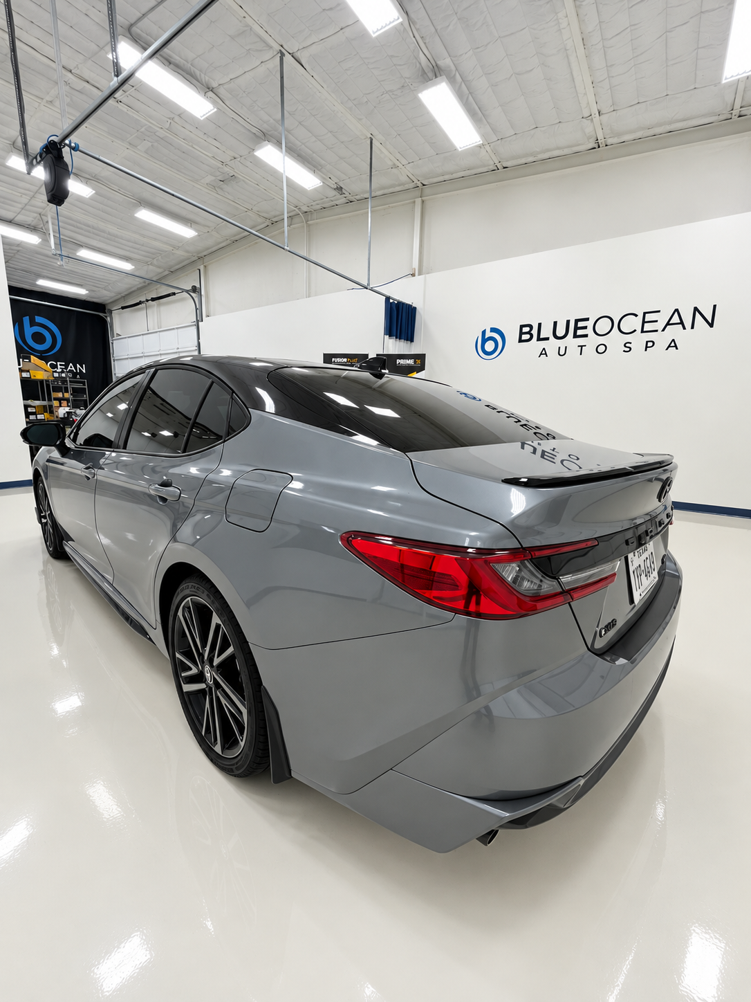 Rear view of 2026 Toyota Camry Hybrid after XPEL XR Plus ceramic window tint