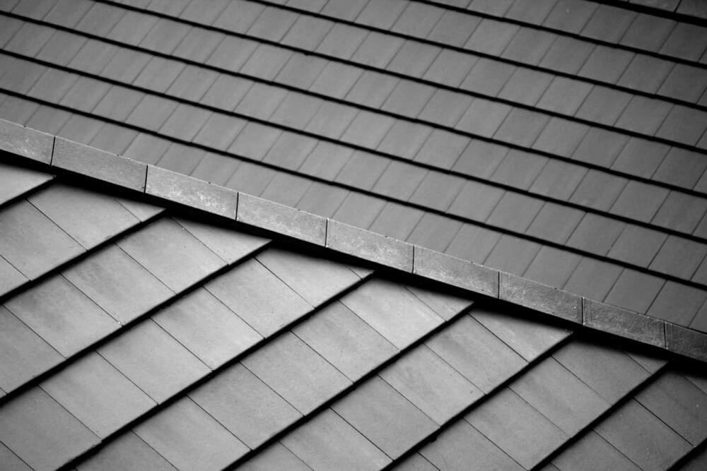 A Black and White Photo of a Tiled Roof — Mr Roof Tiles in Kingscliff, NSW
