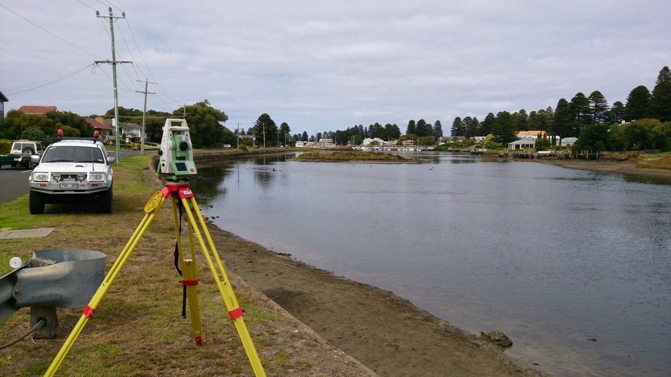 Two Construction Workers Are Looking At A Blueprint On A Table – Warrnambool, VIC - Joseph Land Surveying