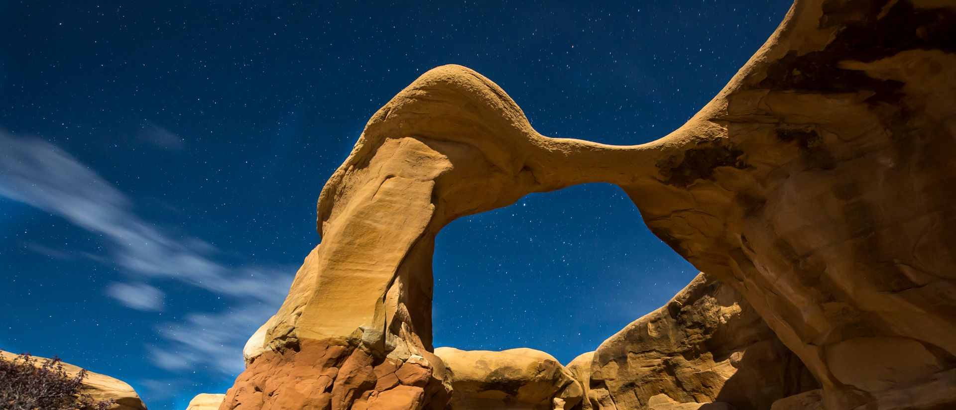 Arch in desert landscape