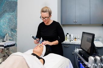 HydraFacial treatment in progress. HydraFacial treatment in progress.