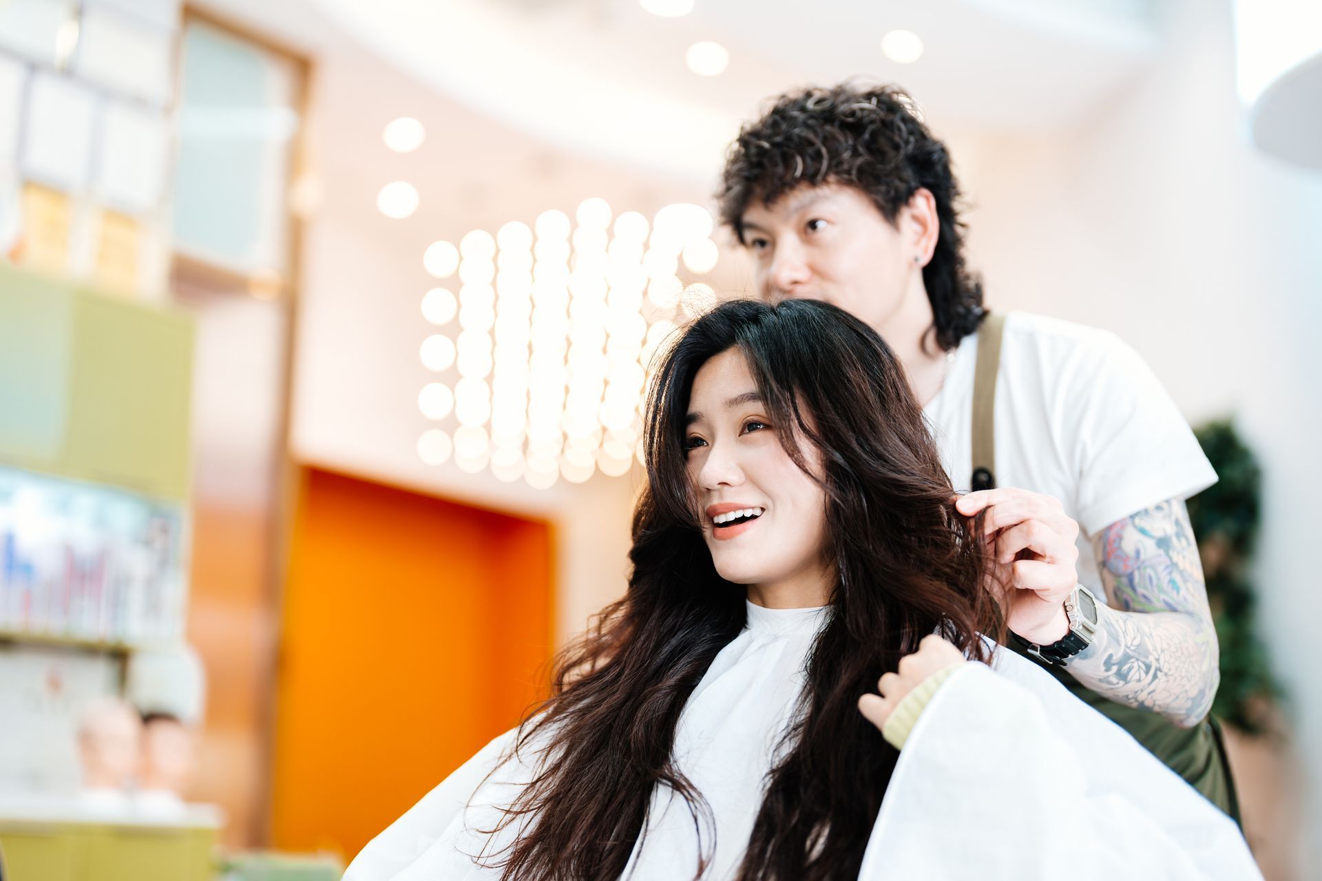 A woman is excited with her new look.