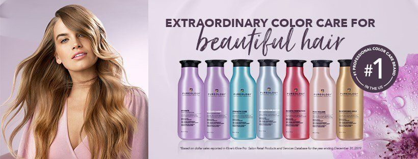 A Woman Is Standing in Front of A Row of Bottles of Hair Products.
