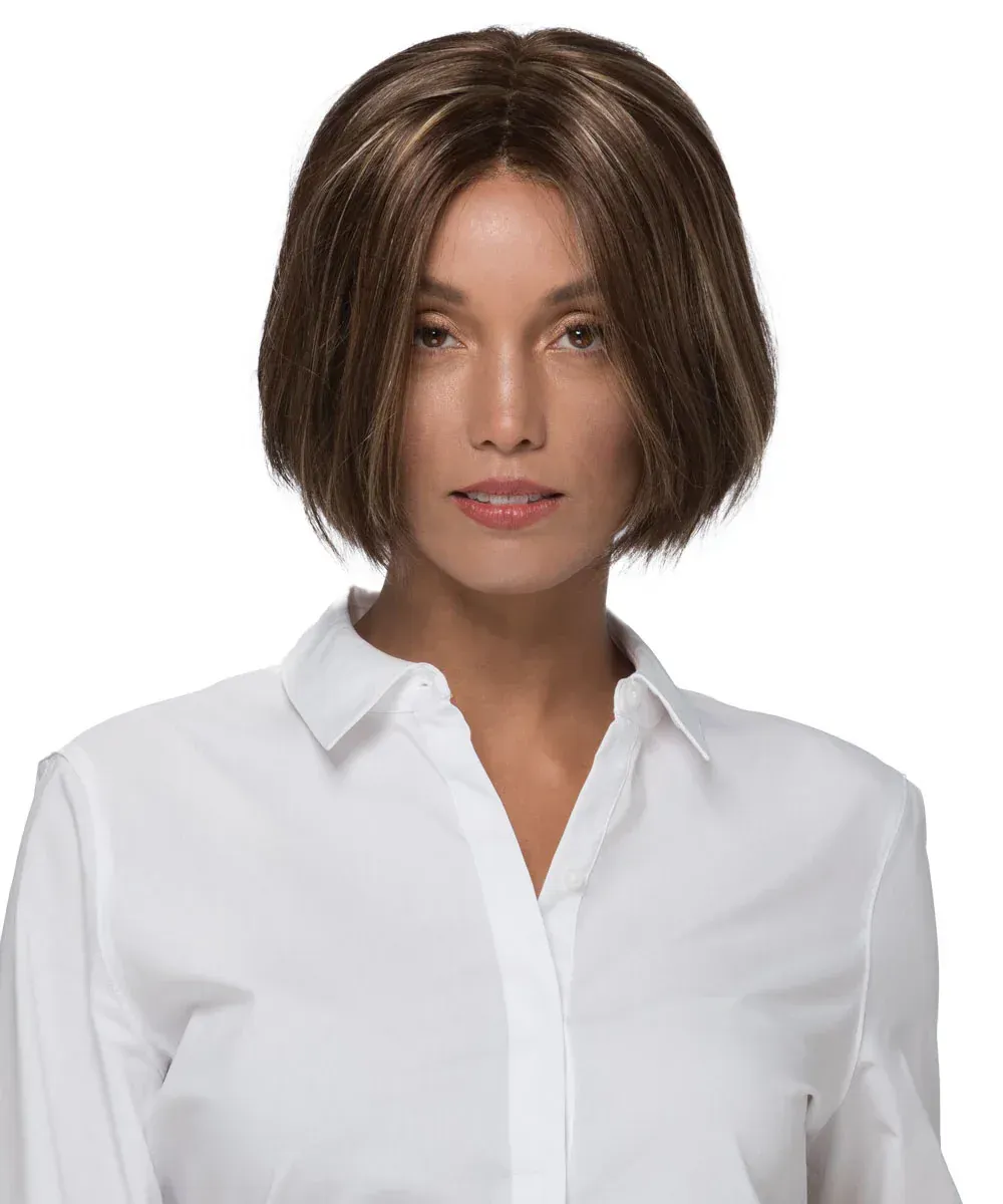 A woman wearing a wig and a white shirt