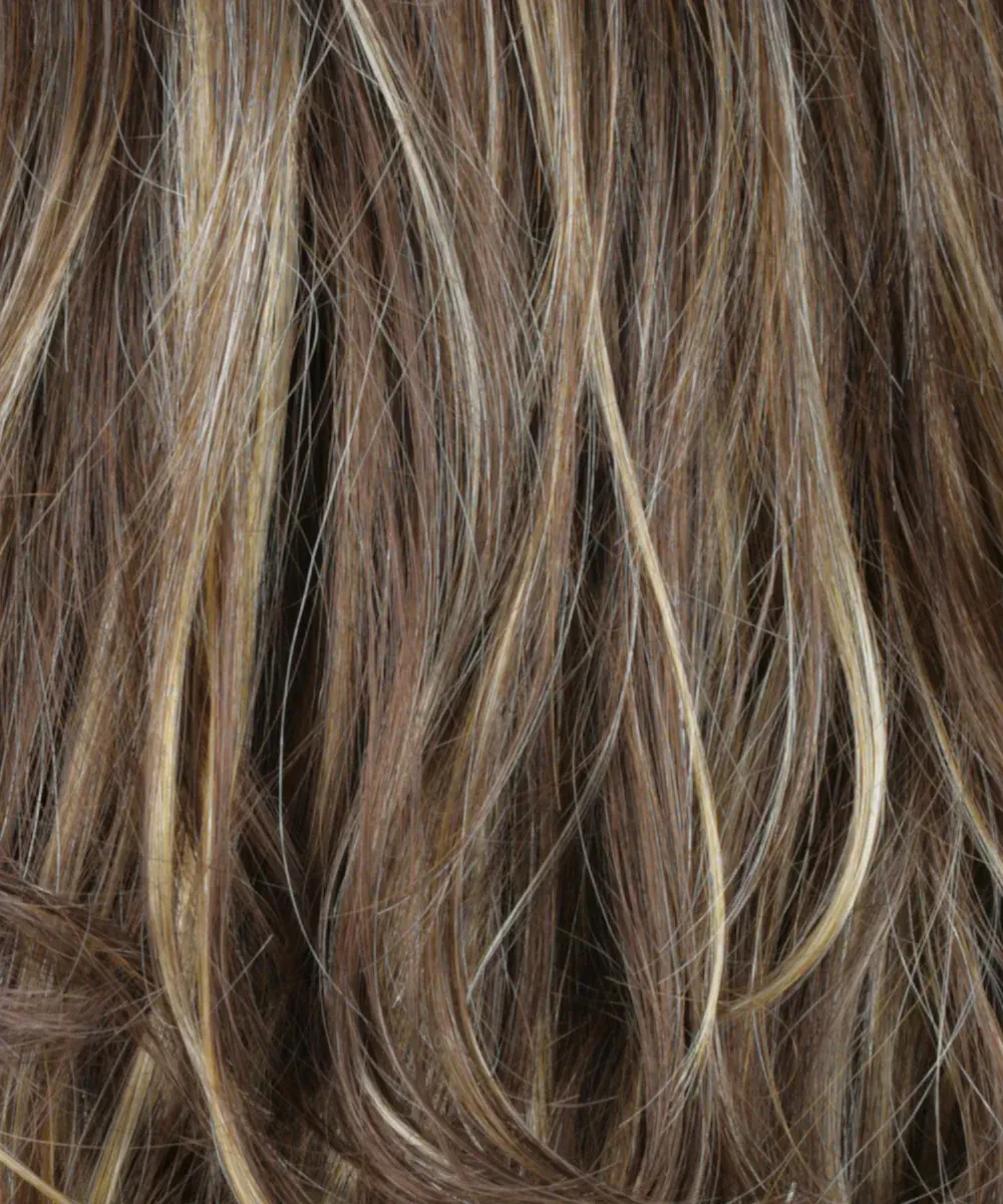 Close-up of wavy brown hair with blonde highlights.