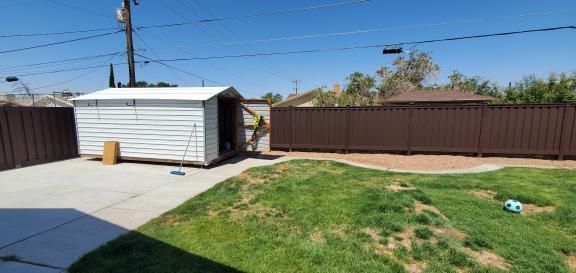 Residential lawn With Wide Fence