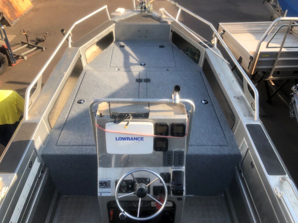 A Boat With a Steering Wheel and a Box That Says Lowrance on It — Allycraft Modifications in Berrimah, NT