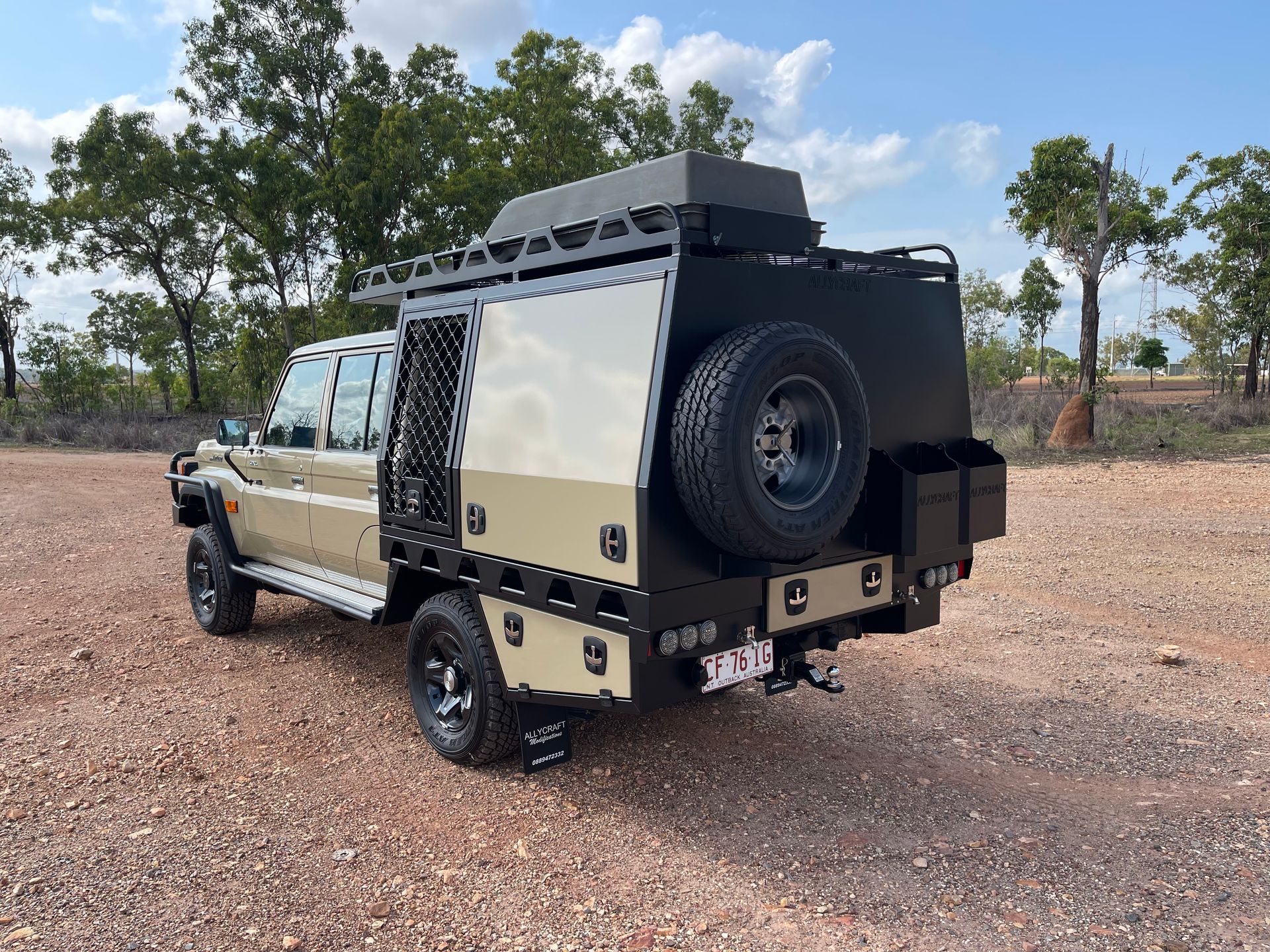 An olive coloured 4 wheel drive with camping modifications — Allycraft Modifications in Berrimah, NT