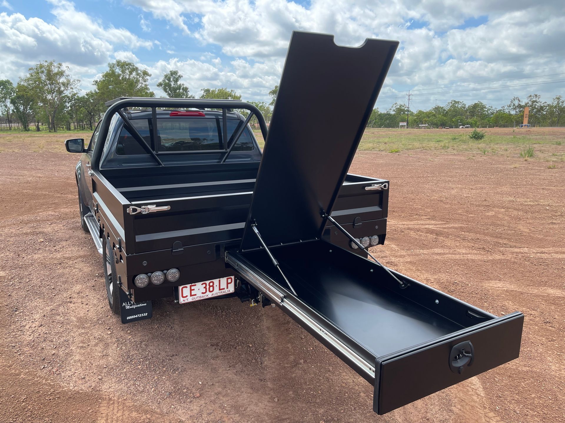 black ute with a drawer open out the back — Allycraft Modifications in Berrimah, NT