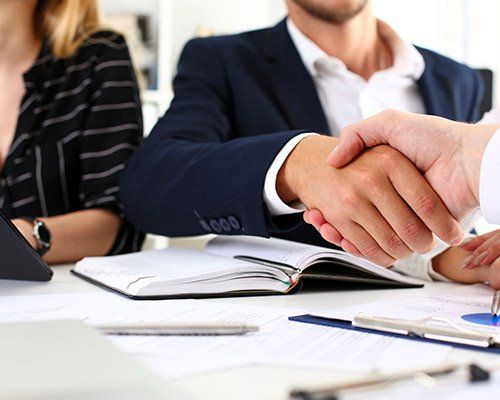 Client and Attorney Handshake — Moab, UT — Fitzgerald Law Office
