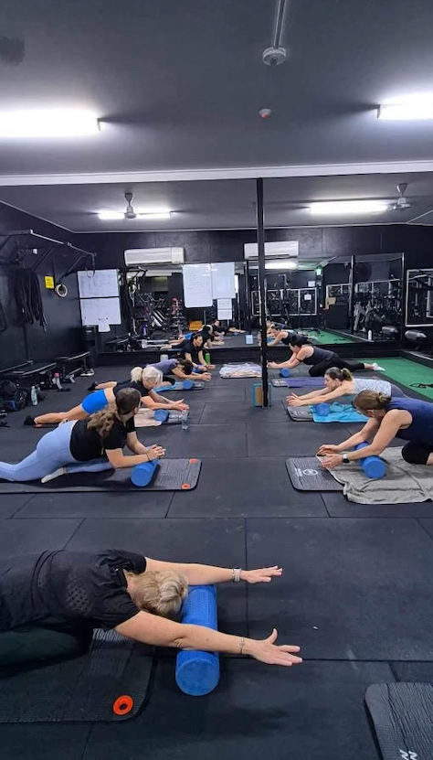 A Group Of People Are Doing Exercises In A Gym — 360 Fitness Group in Gordonvale, QLD