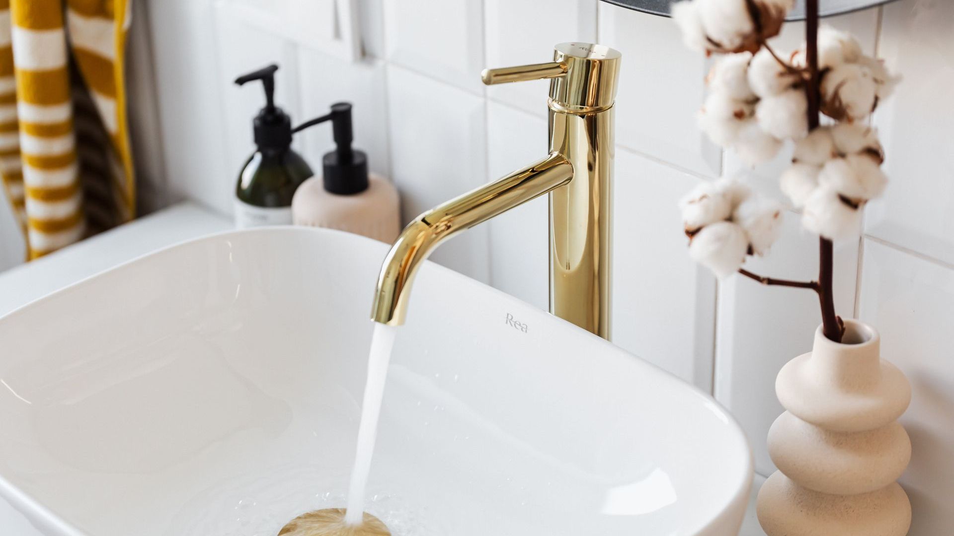 Bathroom tap running water