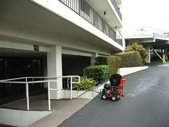 An accessible ramp leads to a building.