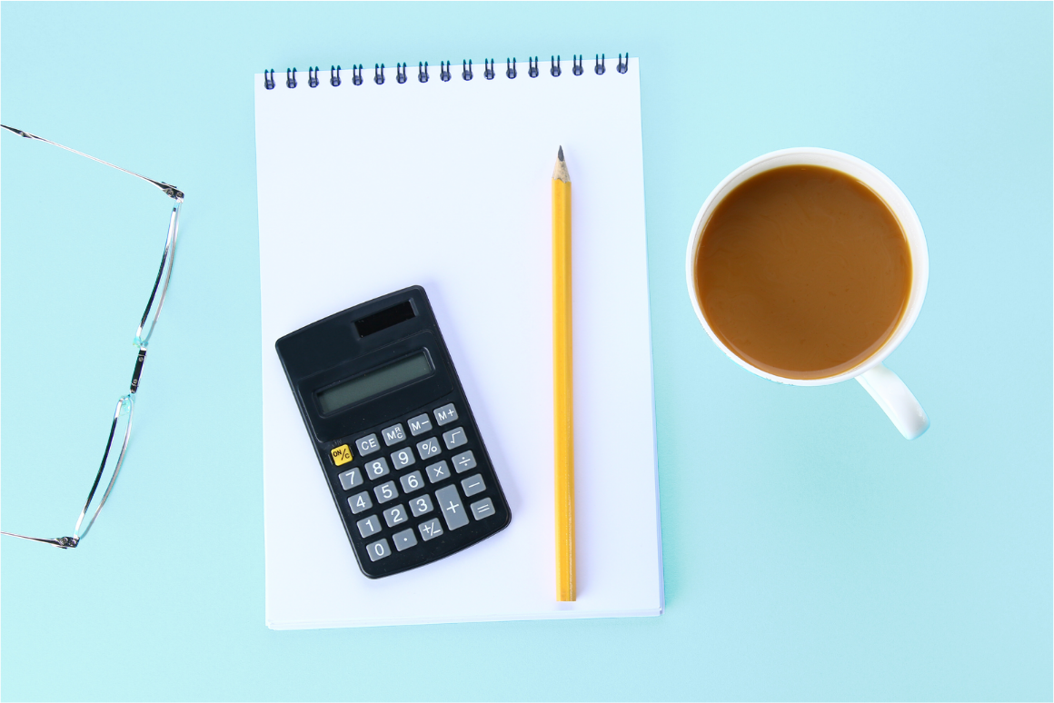 concept art, a calculator and pencil on top of a note book highlighting the research into clean office accessories